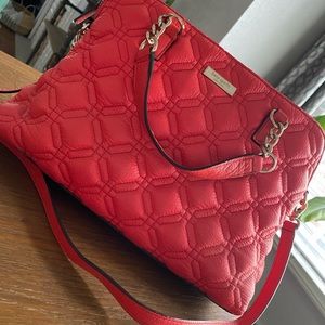 Kate Spade quilted synthetic leather purse.